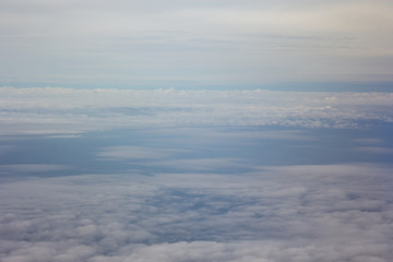 white fluffy clouds in the blue sky