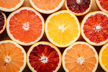 Brightly colored citrus fruit arranged on a table