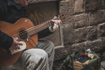 Street musician playing the guitar