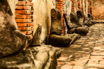 Damaged ancient Buddha statue at Wat Mahathat Ayutthaya, Thailand.