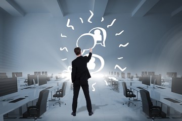 Poster - Composite image of businessman standing and pointing