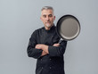 © stokkete - Chef posing with a pan