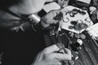 portrait of watchmaker repairing a watch