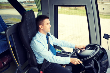 happy driver driving intercity bus