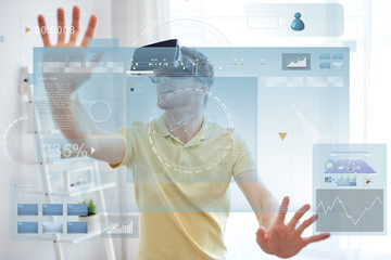 Wall Mural - young man in virtual reality headset or 3d glasses