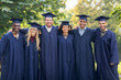 © Syda Productions - happy students or bachelors in mortar boards