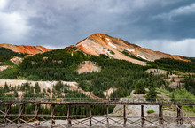 Abandoned Yankee Girl Mine In Colorado With Storm Clouds