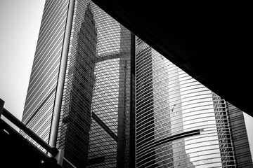 windows of commercial building in Hong Kong with B&W color