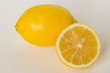 Lemon and lemon slice on white background