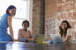 © Monkey Business - Portrait Of Businesswomen Working Together In Boardroom