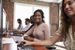 © Monkey Business - Portrait Of Staff In Busy Customer Service Department Shot