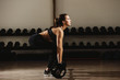 © shevtsovy - fitness woman weightlifting deadlift