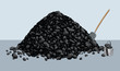 Pile of coal with shovel and bucket