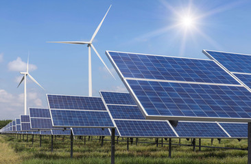 Wall Mural - solar cells photovoltaics and wind turbines generating electricity in power station alternative ener