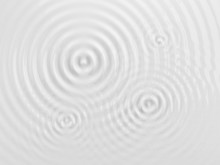 Ripples On A White Liquid Surface.
