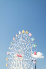 colorful ferris wheel under the blue sky