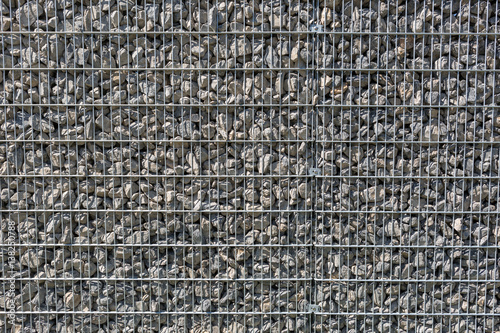Hintergrund Aufgeschuttete Graue Steine Hinter Einem Gitter Buy