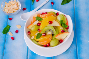 Fresh fruit salad in a bowl. Healthy dish.