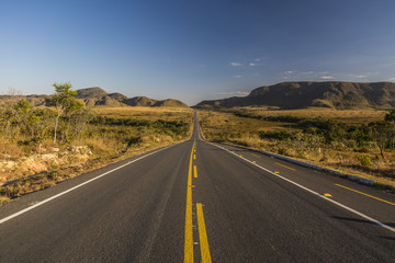 Vintage toned desert long road just before sunrise, travel concept, Brazil