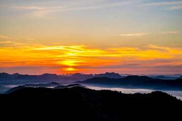 Canvas Print - Beautiful Landscape of Sunrise with mist, sky and cloud shooting from top mountain at Phu Bo Bit, Loei, Thailand