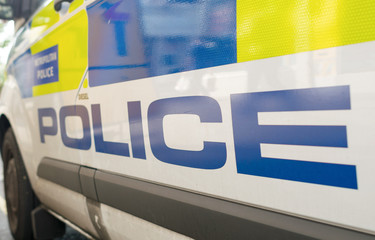 LONDON - JULY 2, 2015 : Police van parked in the street of London. The city is strictly controlled by the police