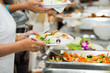 © subinpumsom - people group catering buffet food indoor in luxury restaurant with meat colorful fruits and vegetables