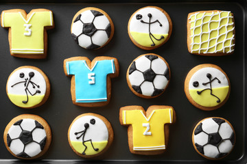 Football cookies on baking tray