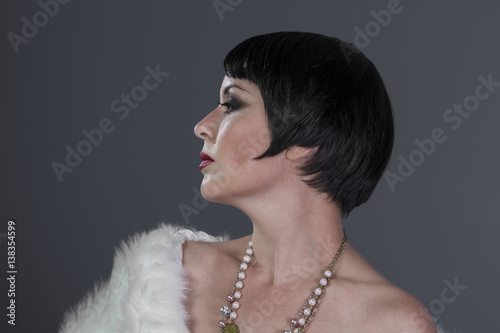 Flapper 1920s Style Brunette Dancer With Short Hair And Jewelry