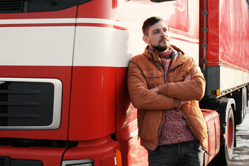 Wall Mural - Handsome driver near big modern truck outdoors