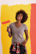 © .shock - black woman painting wall