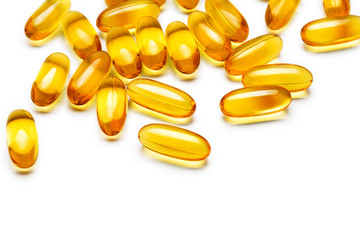 Wall Mural - Fish oil capsules on white background. Close up, copy space, high resolution product. Health care concept