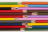 Fototapeta Tęcza - colored pencils for each other. The concept of traffic jams