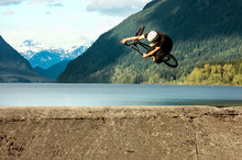 Man Performing Stunt On Bike, Golden Ears Provincial Park, Canada 