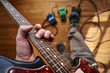 © goodmanphoto - a person playing a guitar and using effect pedals