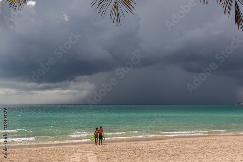 Couple Satands On The Beach And See How A Tsunami Is Coming Buy