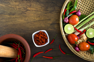 Recipe book with fresh herbs south asia and spices on wooden background, (concept thai food),top view