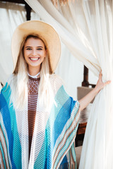 Sticker - Vertical image of smiling woman in alcove