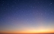 starry in the night sky with sunrise