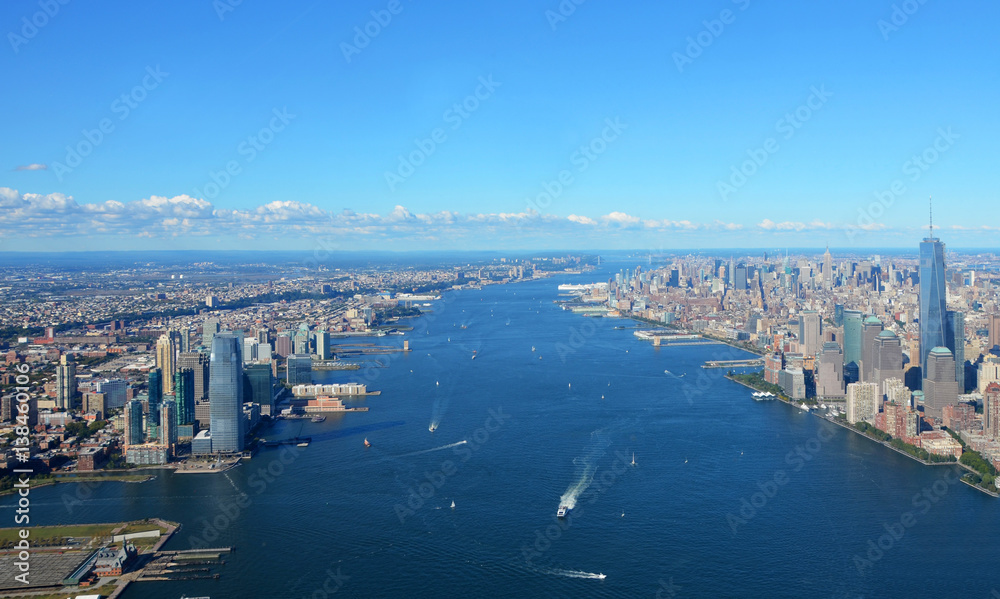 New York, USA, September 28, 2013: New York Harbor with Empire State Building and Hudson River, Aerial view - obrazy, fototapety, plakaty 