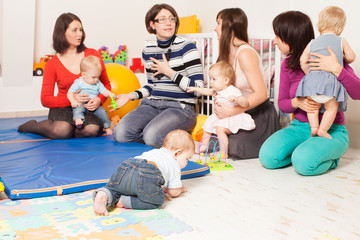 Group of mothers with their babies