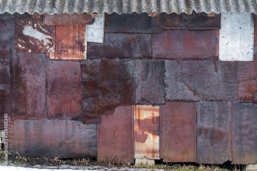 Backdrop Of The Barn Covered With Old Rusty Tin Sheets And Slate
