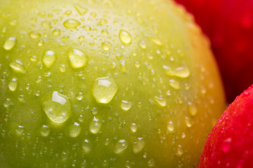 Poster - red wet apple with big droplet, macro shot