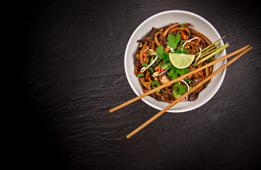 Various of asian meals on rustic background , top view , place for text.