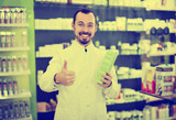 Fototapeta Nowy Jork - Male pharmacist in pharmacy