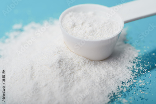 Fotografia Sport supplement, creatine, hmb, bcaa, amino acid or vitamin mesure with powder