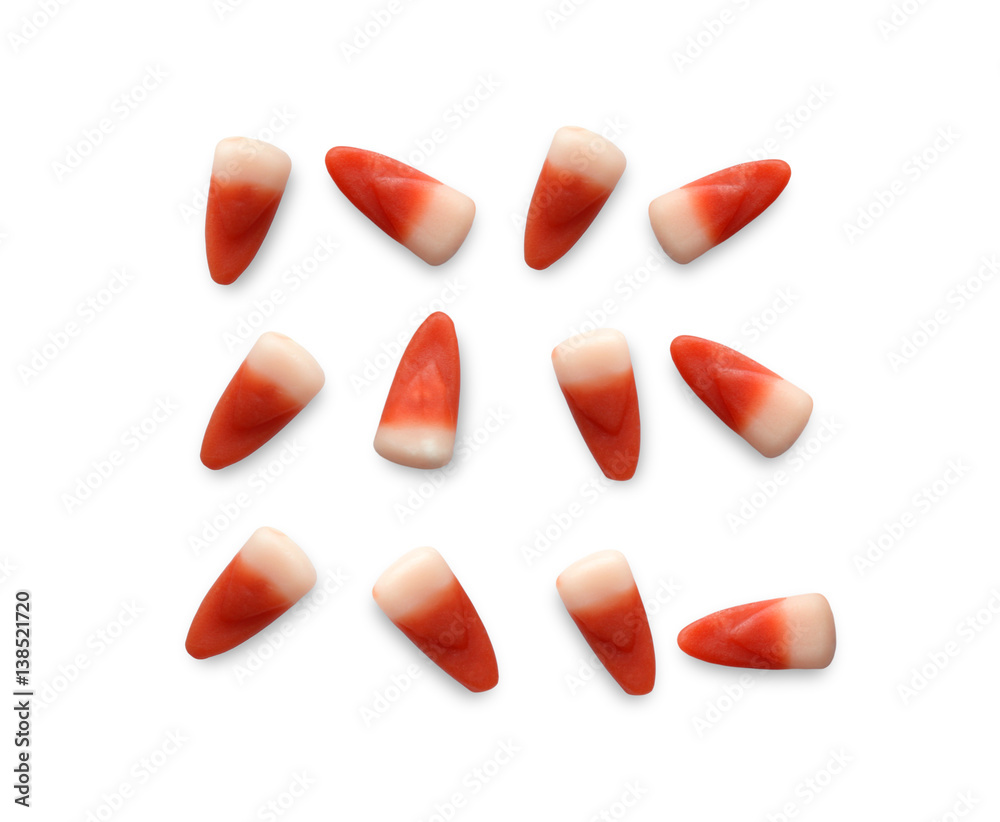 Colorful Halloween candies on white background