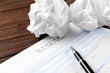 © Africa Studio - Blank resume form and crumpled paper on wooden table, closeup