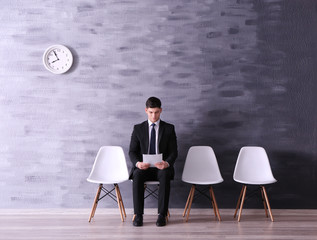 Sticker - Young man waiting for job interview in reception hall