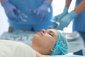 Sticker - Young woman at cosmetology clinic