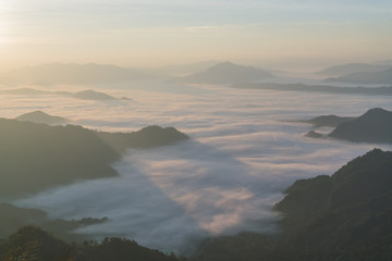 Wall Mural - Fog mountain with sunlight in the morning.